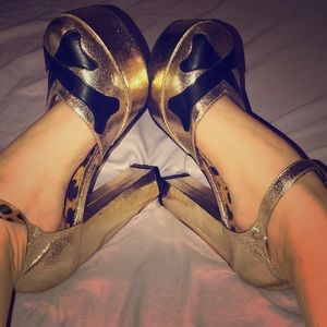 Iron fist gold crossbones high heels
